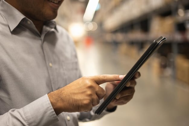 A close-up shot of a logistics professional using a tablet device in a modern warehouse. Shelves stocked with various products are visible in the background, and the lighting is bright and efficient.