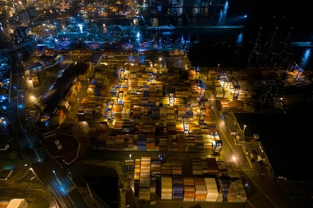 A busy logistics hub with delivery trucks, warehouses, and shipping containers. A digital overlay shows real-time data analytics and tracking information, illustrating the complexity and scale of modern US logistics.