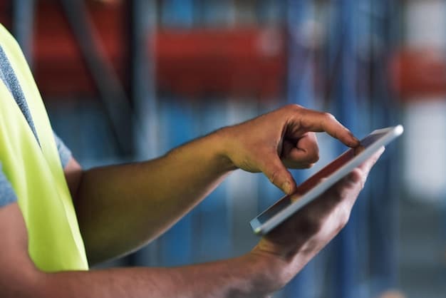 A close-up of a logistics worker interacting with a touchscreen interface on a warehouse management system (WMS). The focus should be on the interface and the worker's hands, conveying the interaction with technology and the need for digital literacy.