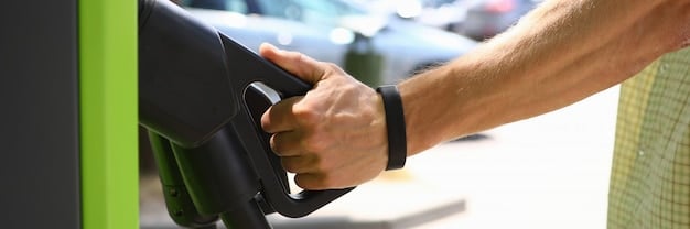 A close-up of an electric car's charging port with a hand plugging in the charger. The image highlights the act of charging an EV and its relevance to the tax credit.