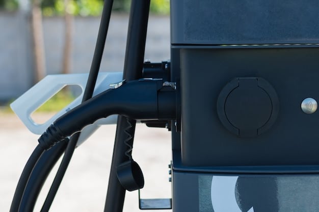A detailed close-up of an electric vehicle's charging port connected to a charging station, emphasizing the technology and infrastructure supporting sustainable transportation.