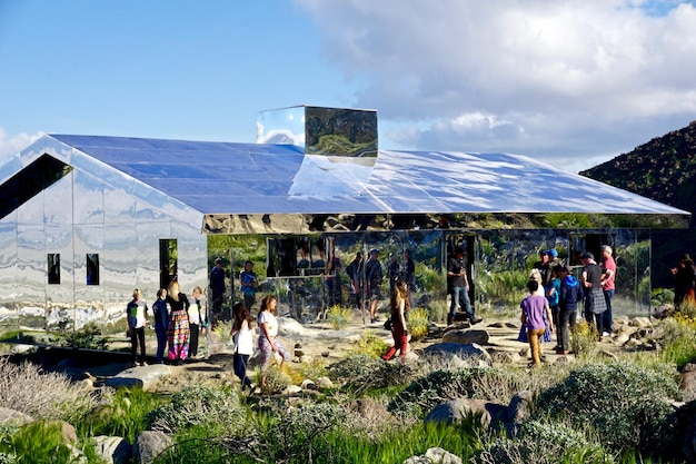 A visual representation of a carbon offset project, showing a solar panel installation in a rural community, highlighting the reduction of carbon emissions through renewable energy.