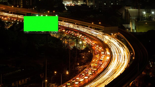 A digital overlay of a traffic signal showing how AI algorithms optimize the timing of green lights based on real-time traffic flow, dynamically adjusting the duration for different directions.