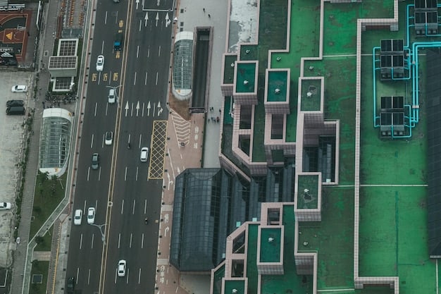 An overhead view of a city intersection redesigned for autonomous vehicles, featuring optimized traffic flow, dedicated AV lanes, and expanded green spaces. The image conveys a sense of efficiency and sustainability.