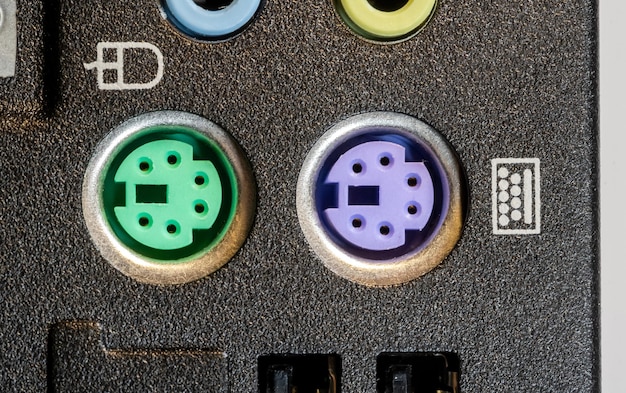 A close-up photograph showcasing different types of EV charging connectors (e.g., CCS, CHAdeMO, Tesla's NACS) with detailed labeling. The image is well-lit, highlighting the physical differences and technical specifications of each connector type.