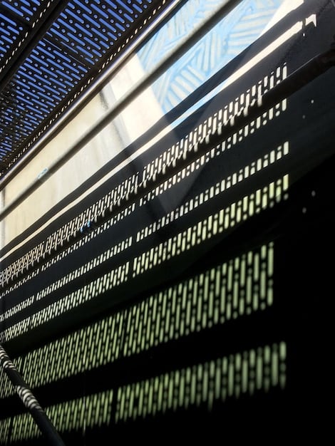 A close-up of a computer screen displaying lines of code and network analysis tools, symbolizing the technical complexity of cyberattacks and the expertise required to defend against them. The image should convey a sense of technical sophistication and vigilance.