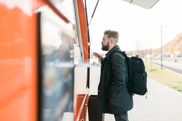A modern bus stop with a digital display showing real-time arrival information and comfortable seating, illustrating improvements in transit infrastructure that encourage ridership.