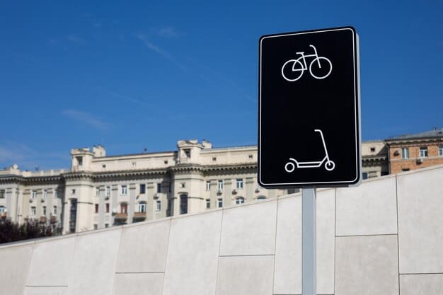 A sign showing traffic rules for e-scooters and e-bikes, including speed limits, designated lanes, and helmet requirements. The sign is placed in a busy urban area to provide clear guidance to riders.