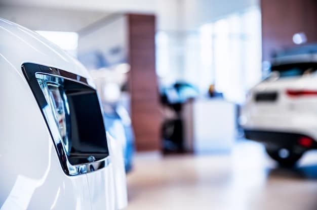 An image of a modern electric car dealership with multiple EVs on display. In the foreground, a service technician is using a digital diagnostic tool on one of the vehicles. The dealership is brightly lit and showcases advanced technology.