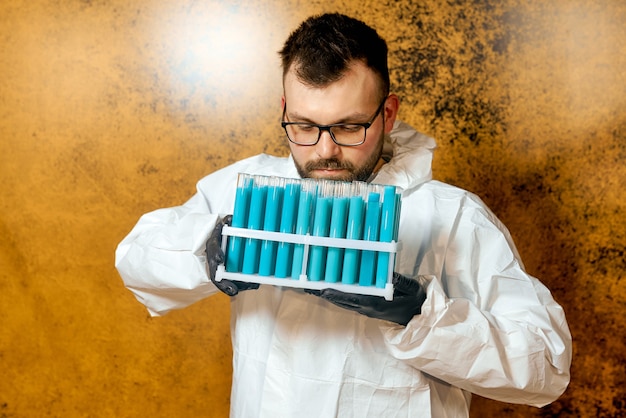 A close-up shot of a scientist in a lab coat working with advanced battery materials or components. The image should focus on the intricate details of battery technology and the precision required in research and development. The background should include lab equipment and other scientists working collaboratively.